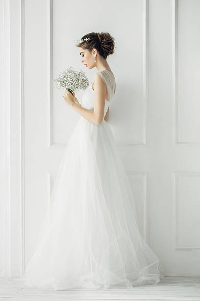 istock Studio shot of young beautiful bride 497343410