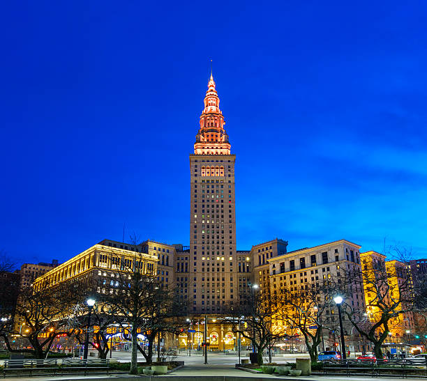 Downtown Cleveland Ohio USA Tower City Center Photo of the landmark Tower City Center in downtown Cleveland, Ohio, USA at twilight blue hour. terminal tower stock pictures, royalty-free photos & images