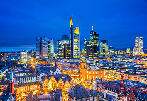 Elevated view over the skyline of Frankfurt with the landmark Christmas Market at the Römer Town Square.