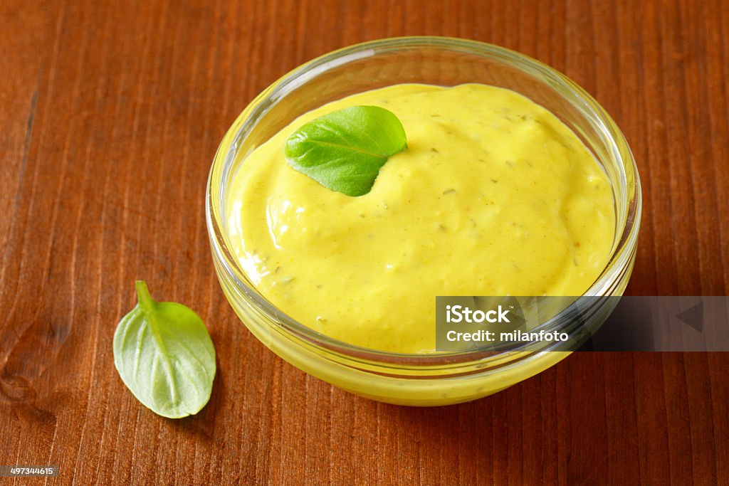 curry sauce bowl of curry sauce on wooden table Basil Stock Photo