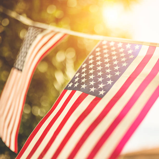 istock United States flag against the sunlight 497344945