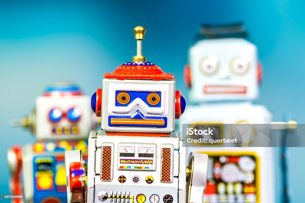 Drei retro Zinn Spielzeug-Roboter - Lizenzfrei Alt Stock-Foto