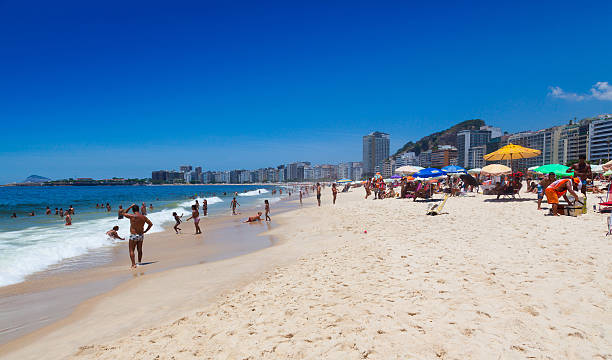 crowd of people at Copacabanain Rio de Janeiro Brazil stock photo