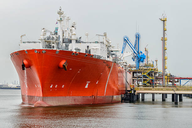 LNG tanker in port Liquefied natural gas tanker ship in port. moored photos stock pictures, royalty-free photos & images