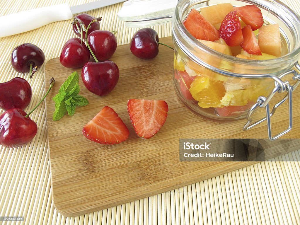 Fruit salad in the glass for takeaway Fruit salad in the glass for takeaway - Obstsalat im Glas zum Mitnehmen Chopping Food Stock Photo