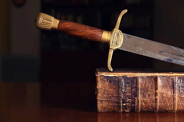 Photo of Sword On Old Bible