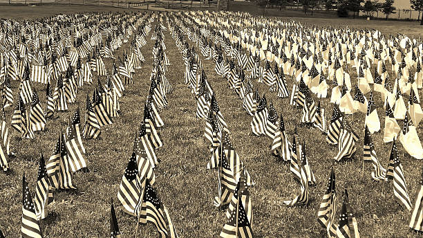 istock Civil war battlefield and flags using sepia tones 497346465