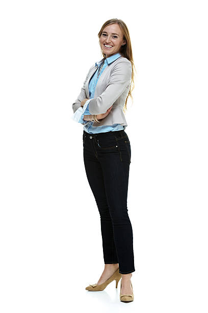 istock Cheerful businesswoman standing & looking at camera 497346667