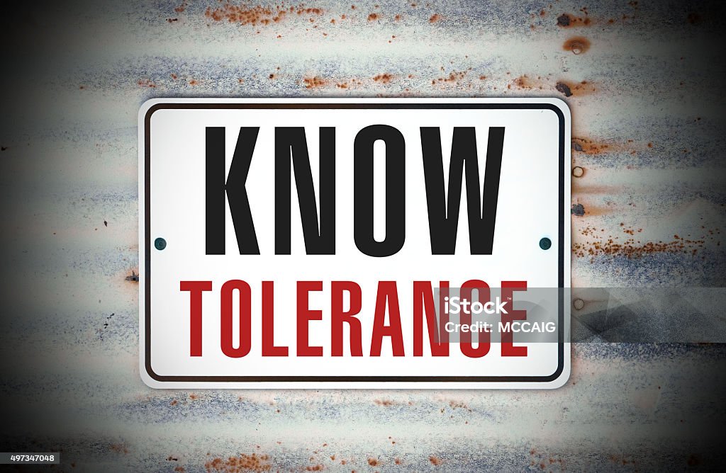 Know Tolerance A sign that says "Know Tolerance." Police Force Stock Photo