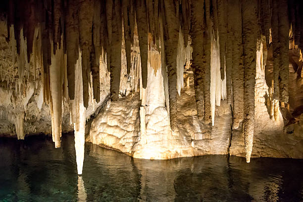 istock Strange Looking Formations Over Clear Lake in Crystal Caves 497347162