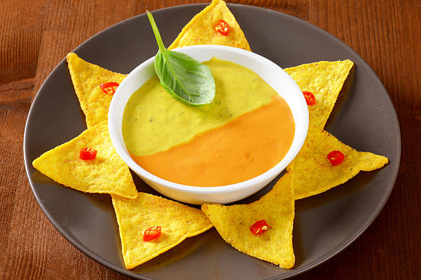 istock nachos and mexican sauces 497347223