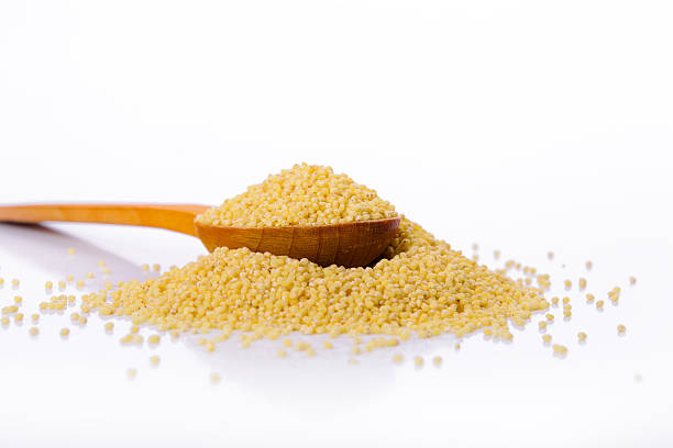 istock Millet in a wooden spoon 497347419