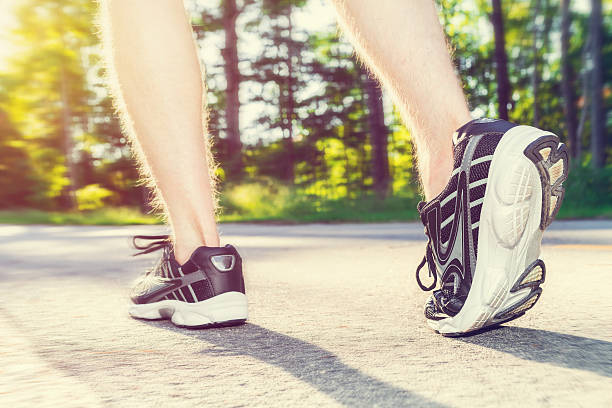 istock Athlete young man running outside 497348160