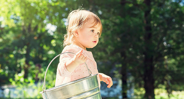 istock Happy toddler girl playing outside 497348342