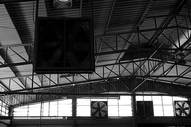 close up black and white old factory fan