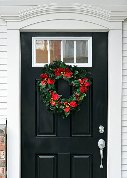 istock Christmas Wreath on Door 497351024