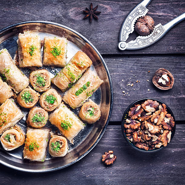 istock Turkish delights baklava on wooden table 497352022