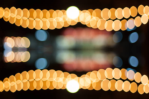 istock Christmas lights defocused background. Vintage styled holiday ab 497352900