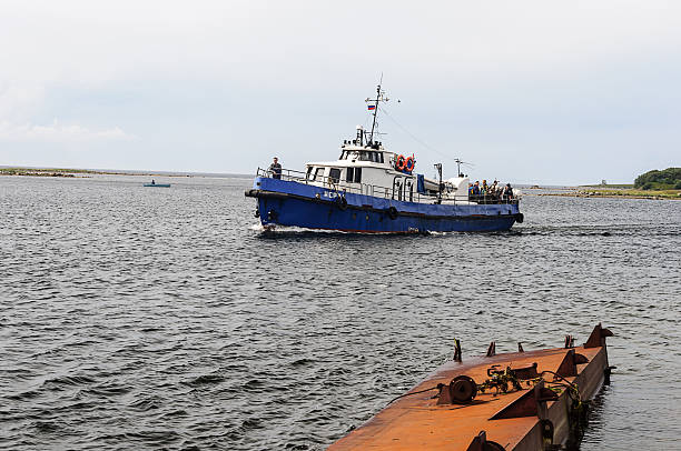 Marine boat with tourists stock photo