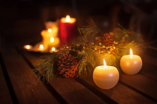 istock Christmas candles and ornaments over dark background 497356462