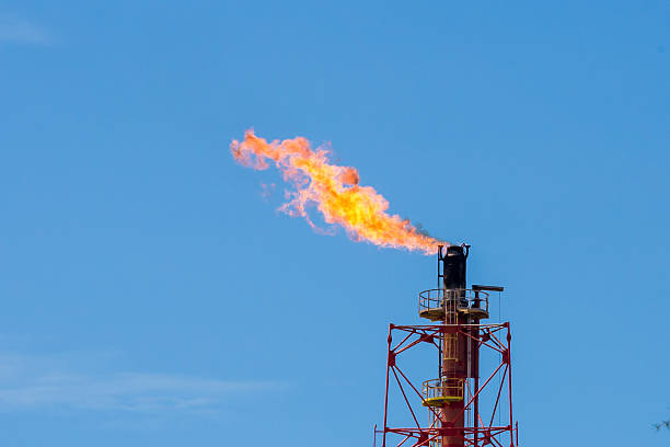istock Gas or flare burn on offshore platform 497356964