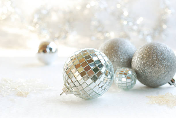 istock Christmas, New Year silver ball, snow on white silver background 497357102