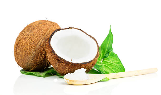 Coconut with green leaves stock photo