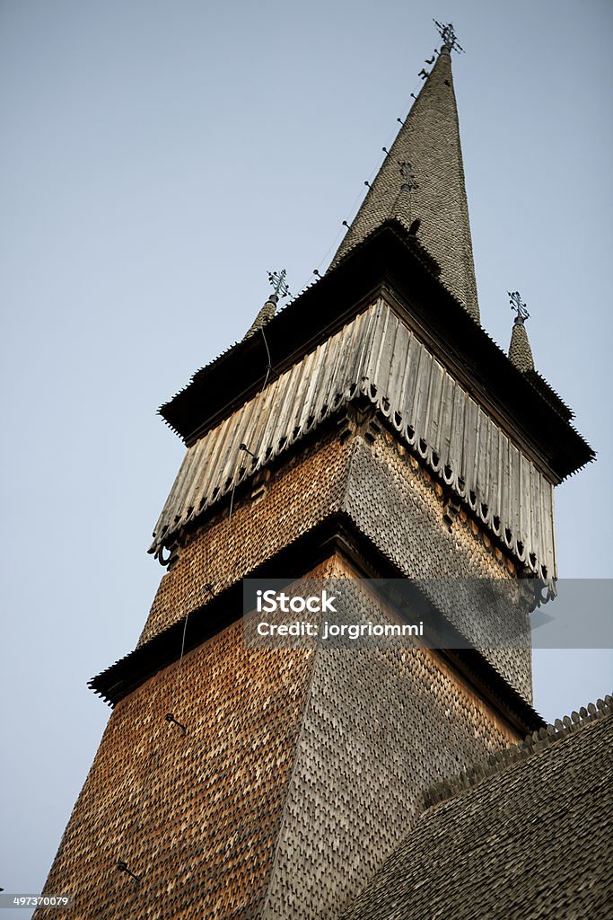 Maramures wooden bell tower Detail of the bell tower of ypical church of Maramures region, Romania, entirely made of wood Architecture Stock Photo