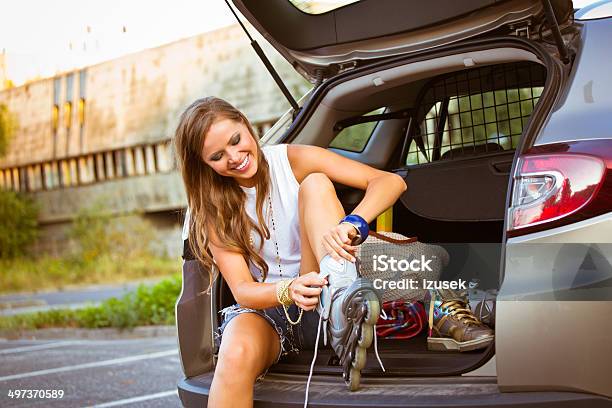 Young Female Skater Stock Photo - Download Image Now - Car, Inline Skate, Skateboarding