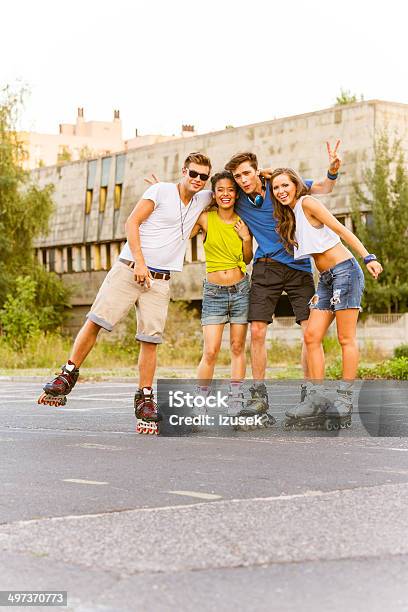 Young People On Rollerblades Stock Photo - Download Image Now - Fun, Roller Skating, Skate - Sports Footwear