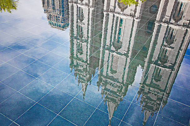Salt Lake City Temple Reflection in the water of the Salt Lake Temple. mormonism stock pictures, royalty-free photos & images