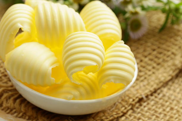 istock fresh yellow dairy butter in a white bowl 497372315