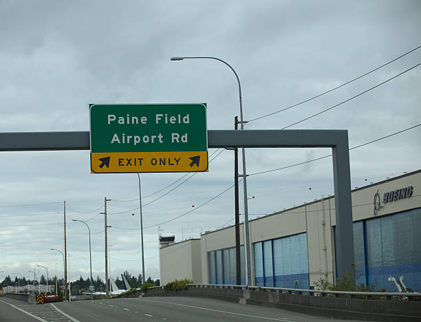 Boeing Everett Plant Everett, United States - May 28, 2014: This image shows the highway exit in front of the Boeing plant in Everett, Washington State. Boeing is a major producer of aircraft and a huge part of the local economy in Washington State. everett washington state photos stock pictures, royalty-free photos & images
