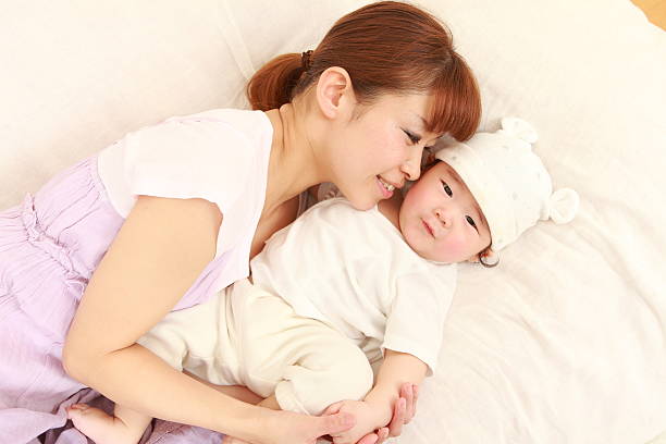 istock Japanese mom and her baby 497376271