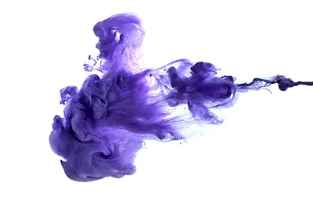 Photo of Purple acrylic paint in water.