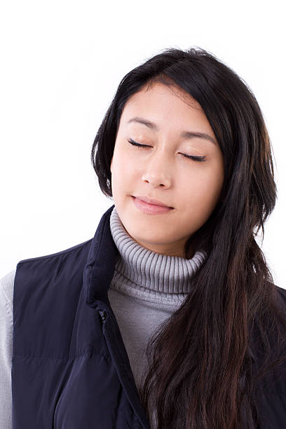 istock relaxed, carefree woman closed her eyes, isolated 497380108