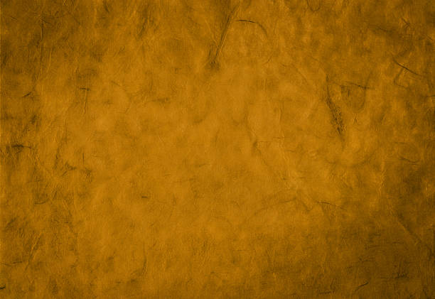 istock Decorative golden background from organic handmade paper with fiber texture 497380416