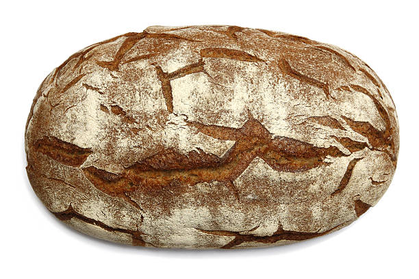 monture ovale marron bread loaf avec une texture unique - brown bread bread wheat bakery photos et images de collection