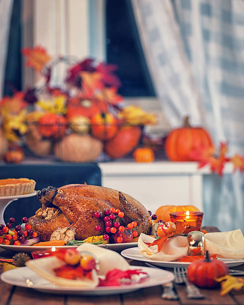 istock Roasted Thanksgiving Turkey with Side Dishes 497386394