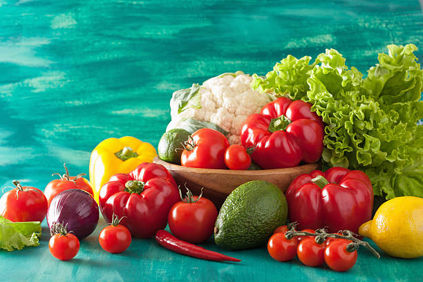 istock raw vegetables tomato pepper avocado onion cauliflower lettuce 497387386