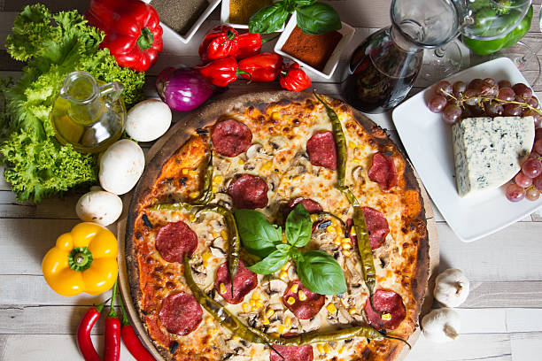 istock Ingredients needed to prepare classic pizza form Italy 497387442
