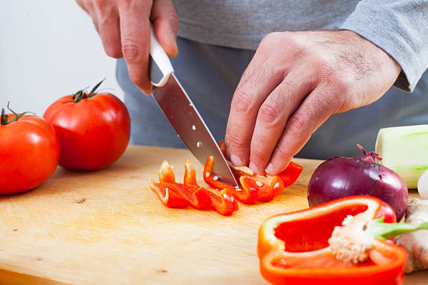 istock Preparing fresh organic food. Cutting vegetables 497388720