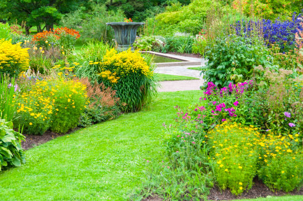 istock Garden with a big urn in a pond 497388925