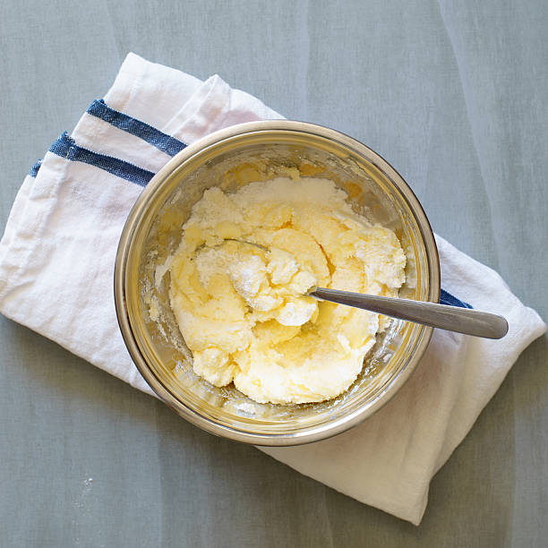 istock Softened butter with sugar and powdered sugar in metal bowl 497389974