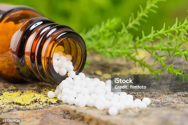 Alternative Medicine With Herbal Pills Stock Photo - Download Image Now - Homeopathic Medicine, 2015, Alternative Medicine