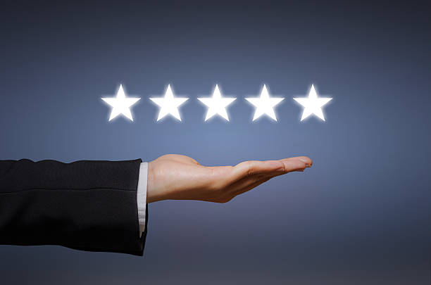 istock Businesswoman pointing five star 497392596