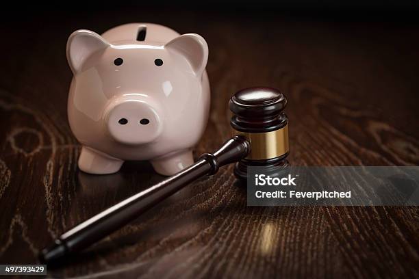 Gavel And Piggy Bank On Table Stock Photo - Download Image Now - Authority, Bribing, Coin Bank