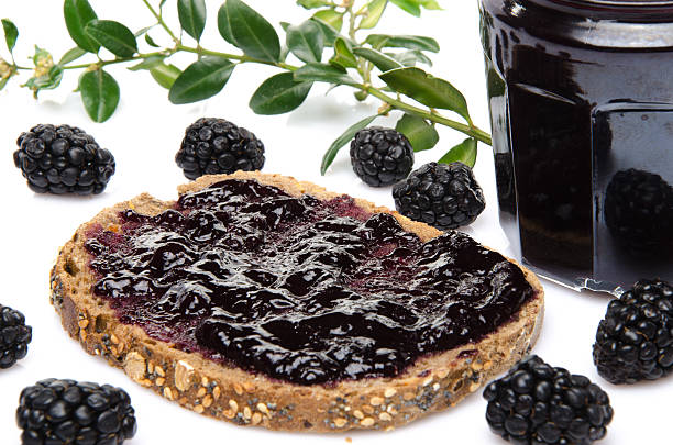 istock Toast with blackberry jam and fresh blackberries 497393531
