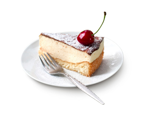 Milk souffle (bird's milk) cake with fresh cherry isolated on white background