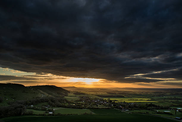 istock Stunning Summer sunset across countryside landscape with dramati 497394635